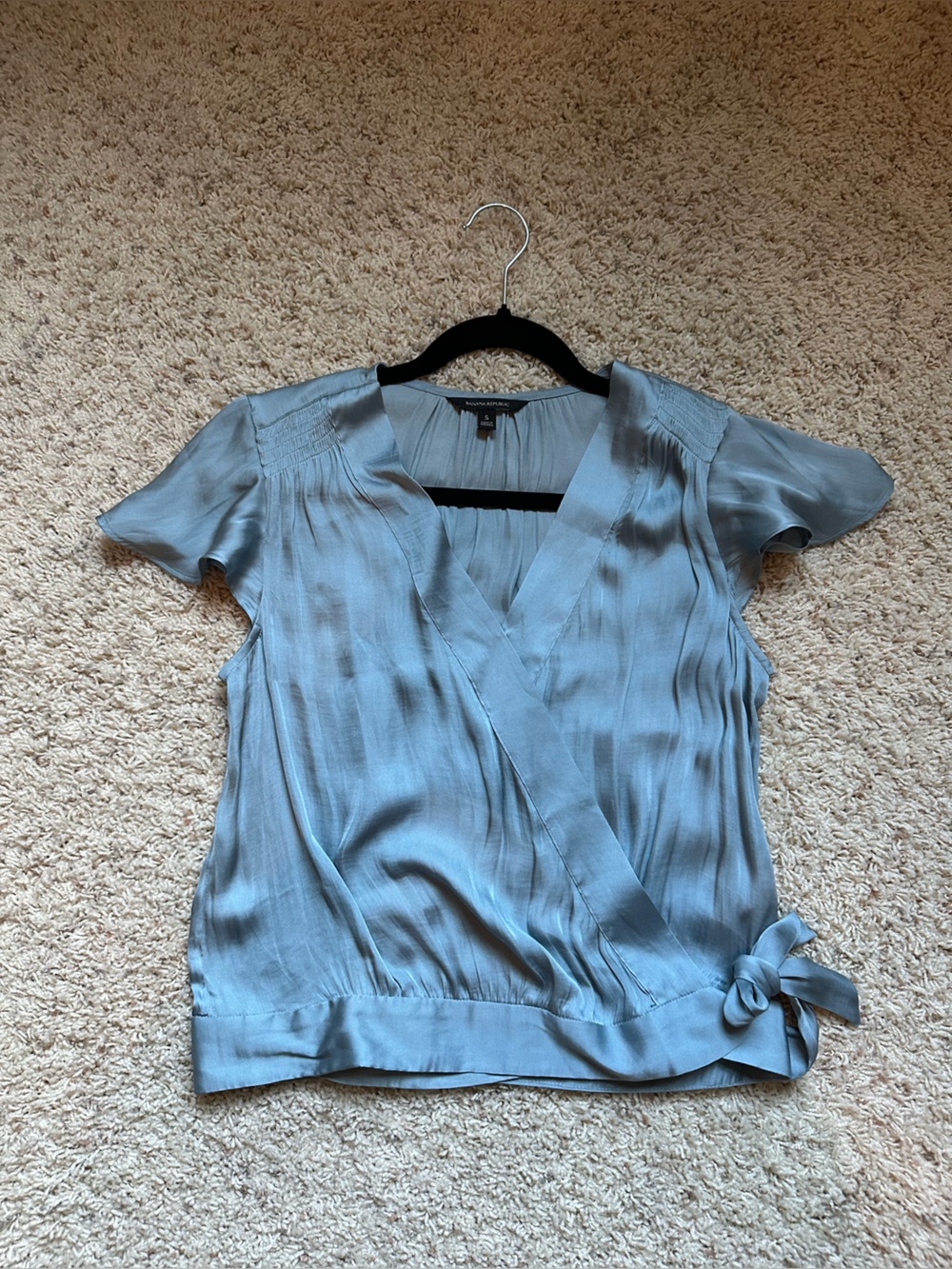 Banana republic blue satin wrap top with tie detail and flutter sleeves
